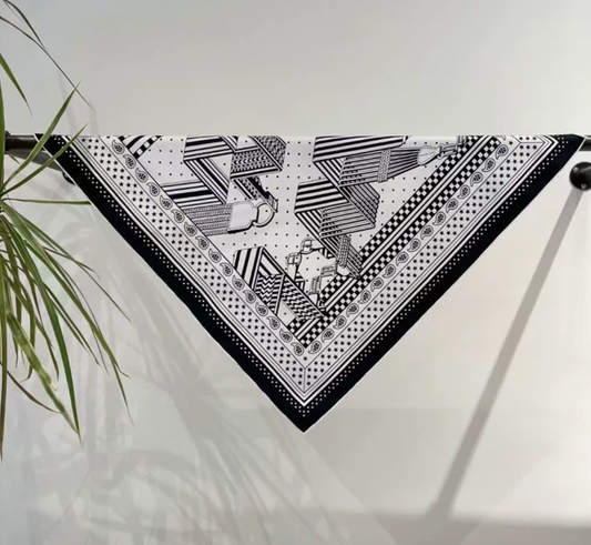 Wrap yourself in understated luxury with our 65×65cm silk scarf, crafted from 100% premium mulberry silk