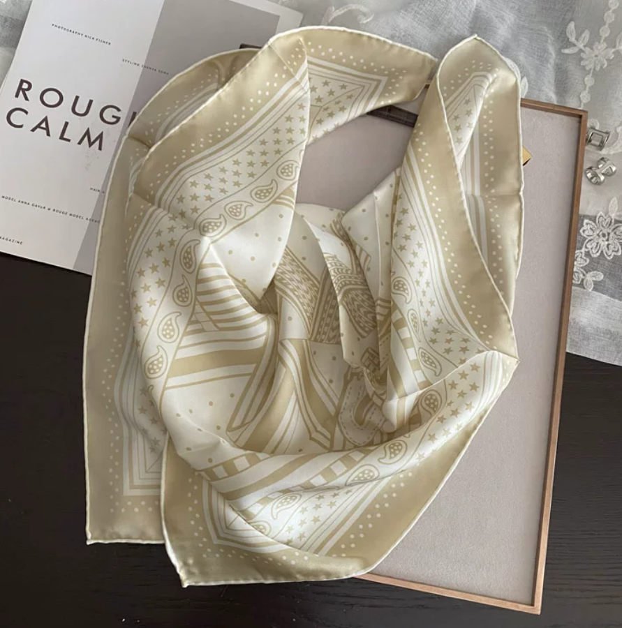 Wrap yourself in understated luxury with our 65×65cm silk scarf, crafted from 100% premium mulberry silk