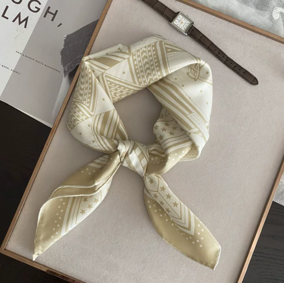 Wrap yourself in understated luxury with our 65×65cm silk scarf, crafted from 100% premium mulberry silk